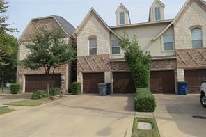 2222 Kirby Street Dallas, TX 75204 - Photo 1 of 25 Townhome exterior showcasing mixed material facade with stone and brick accents
