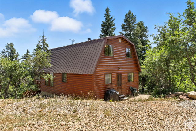 1180 Oak Road Coalville, UT 84017 - Photo 2 of 25 View of home's exterior featuring a gambrel roof and a metal roof