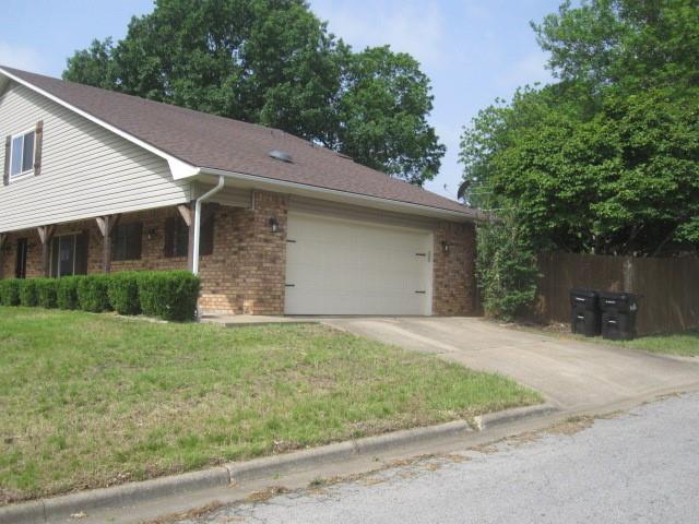 2801 Pyramid Circle Denison, TX 75020 - Photo 3 of 18 a front view of house with yard and trees
