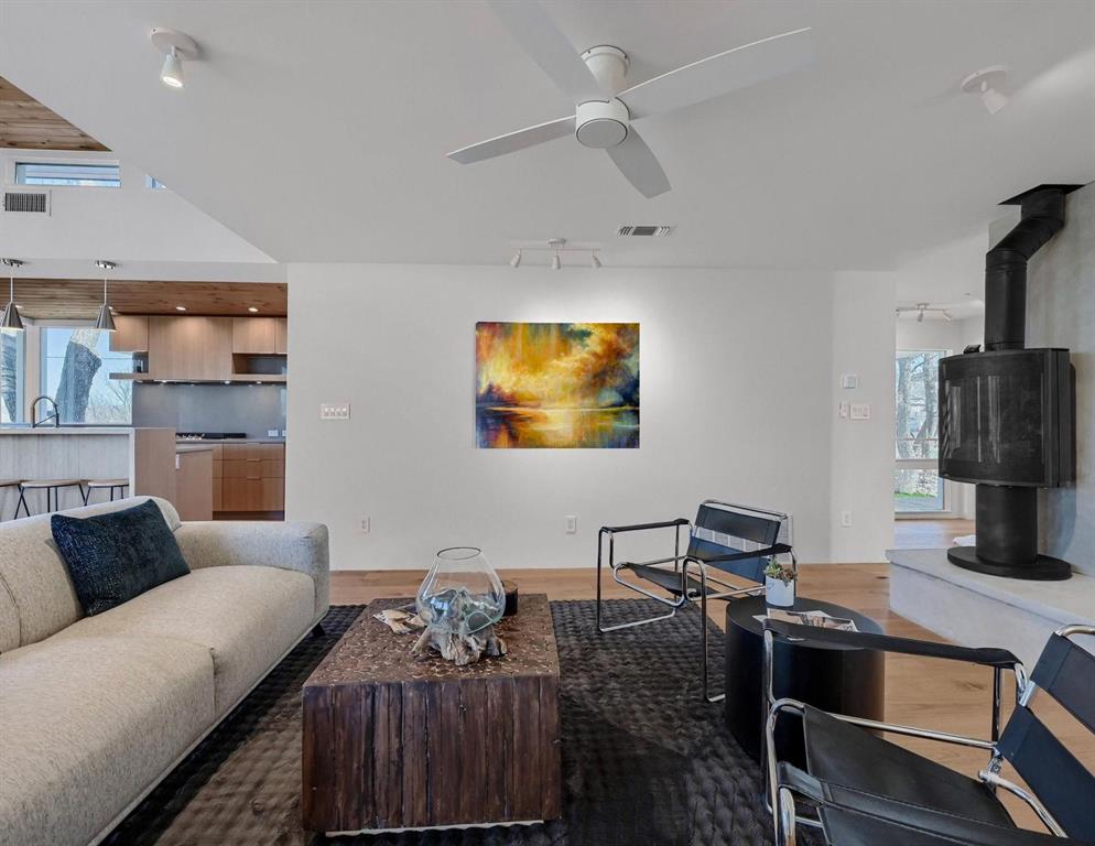 715 North Elm Street Sherman, TX 75090 - Photo 14 of 39 a living room with furniture and a flat screen tv