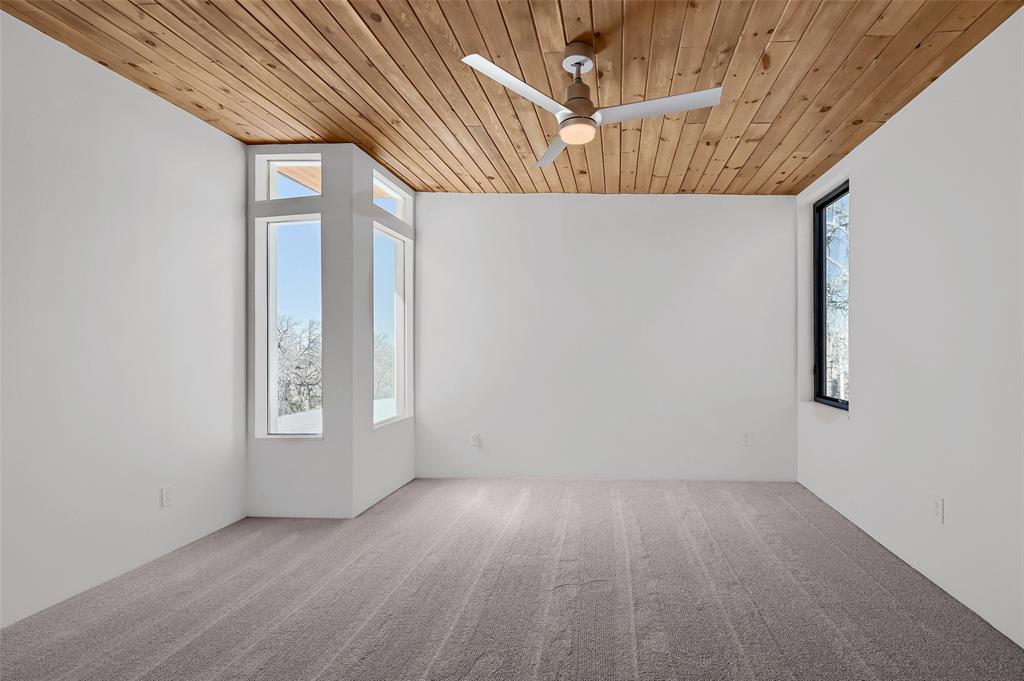 715 North Elm Street Sherman, TX 75090 - Photo 25 of 39 an empty room with windows
