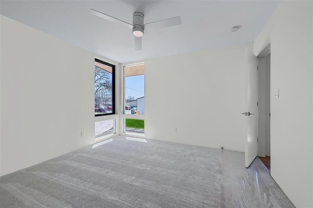 715 North Elm Street Sherman, TX 75090 - Photo 26 of 39 a view of an empty room with a window