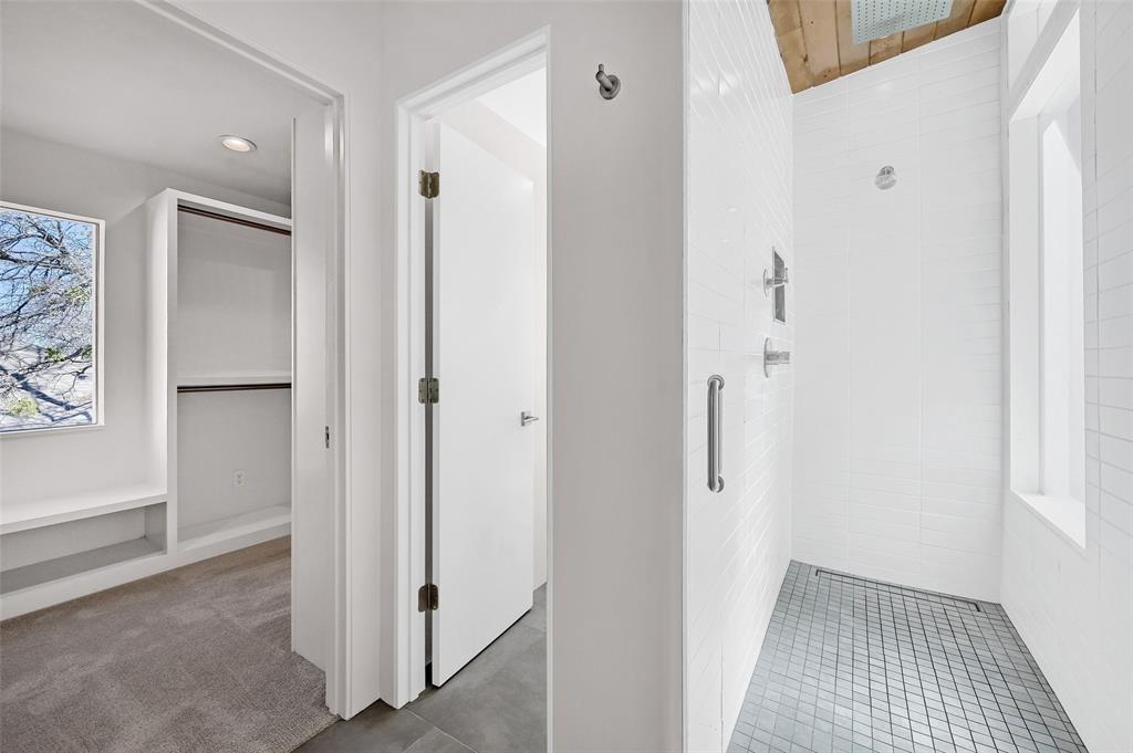 715 North Elm Street Sherman, TX 75090 - Photo 28 of 39 a view of a hallway with wooden floor and closet area