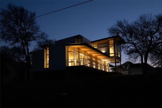 a view of a house with a street
