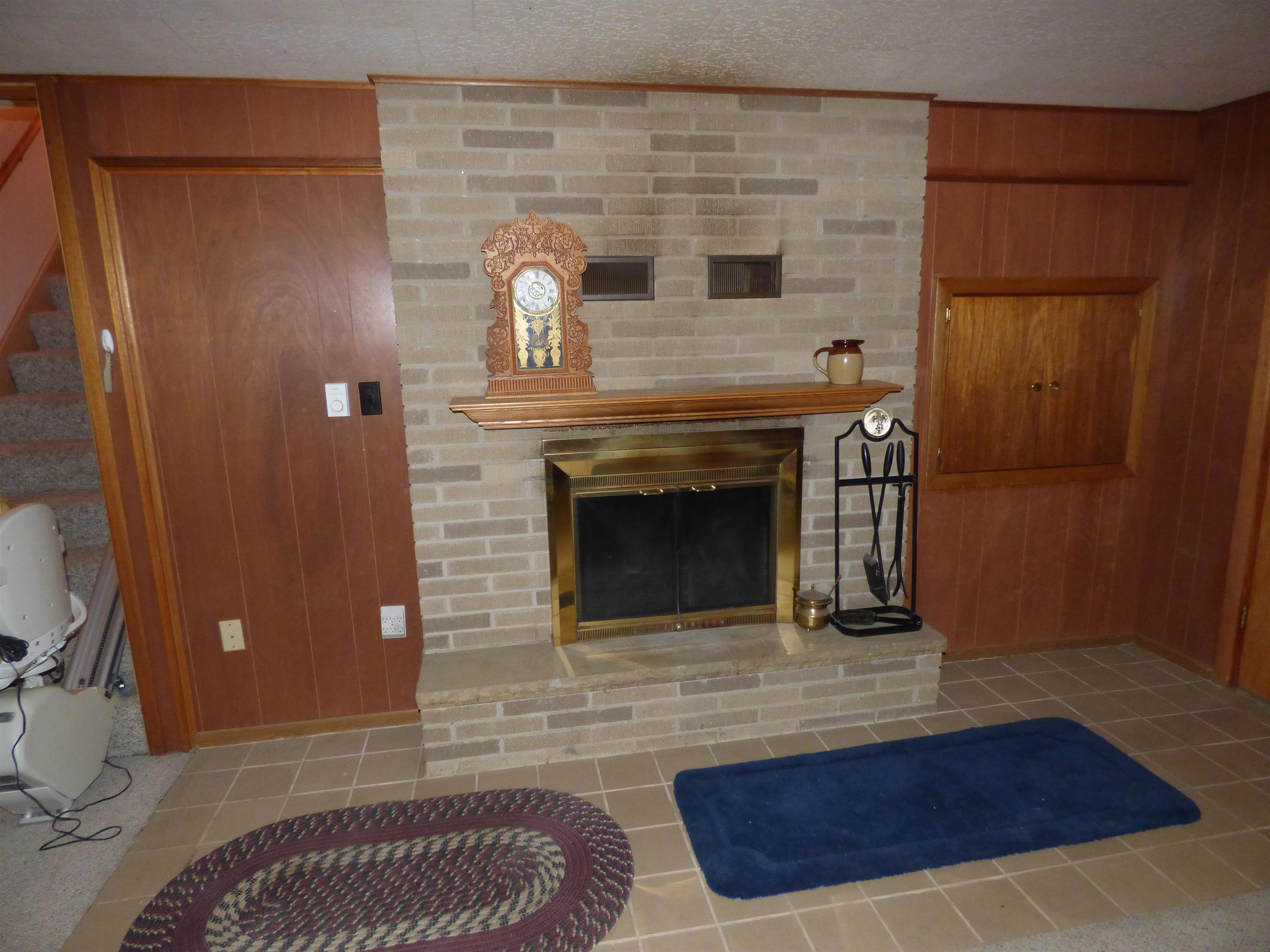 314 South Main Street Elizabeth, IL 61028 - Photo 26 of 43 a close view of a fireplace in a bathroom