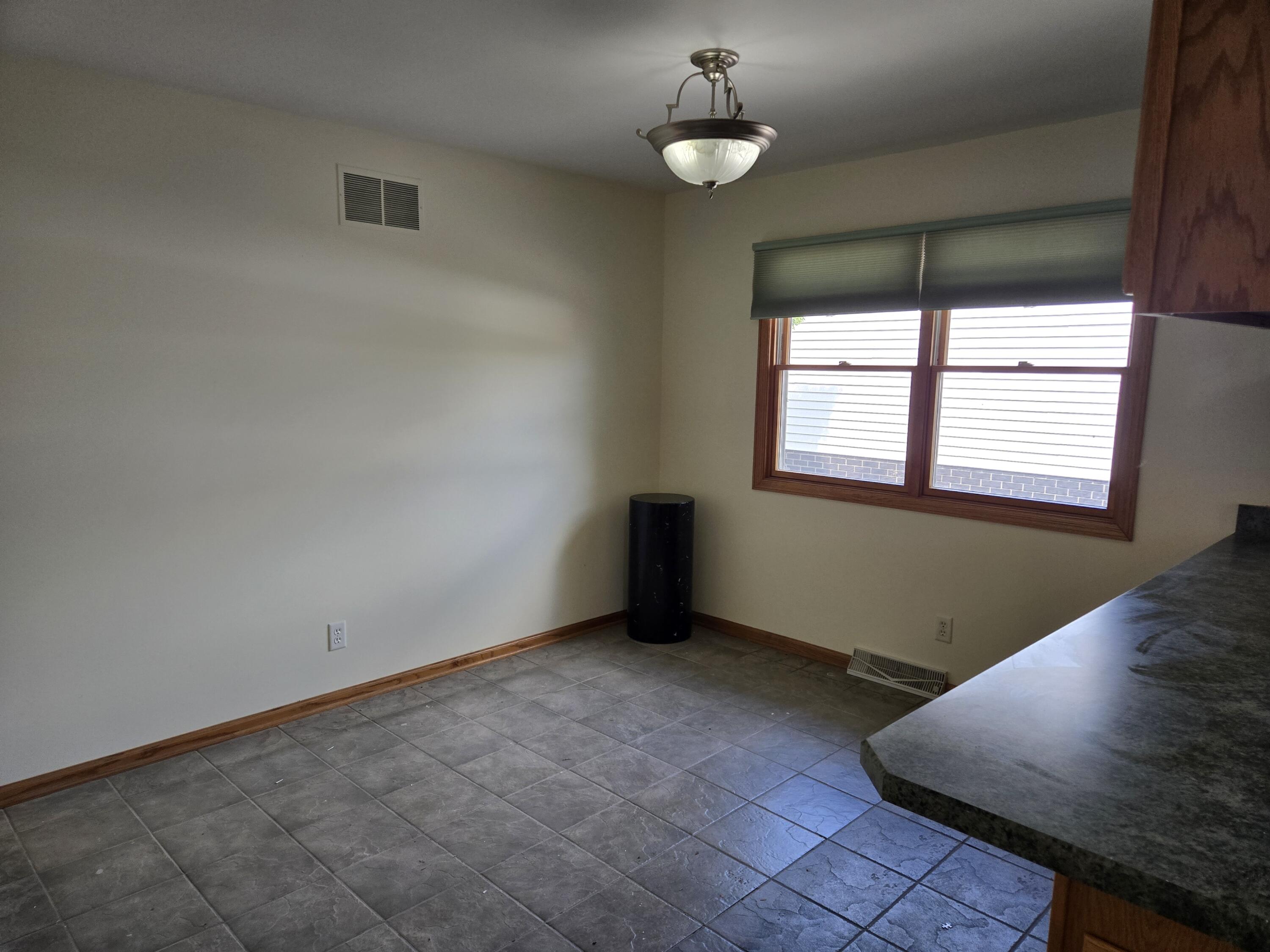 1828 Wren Drive Munster, IN 46321 - Photo 11 of 36 an empty room with windows