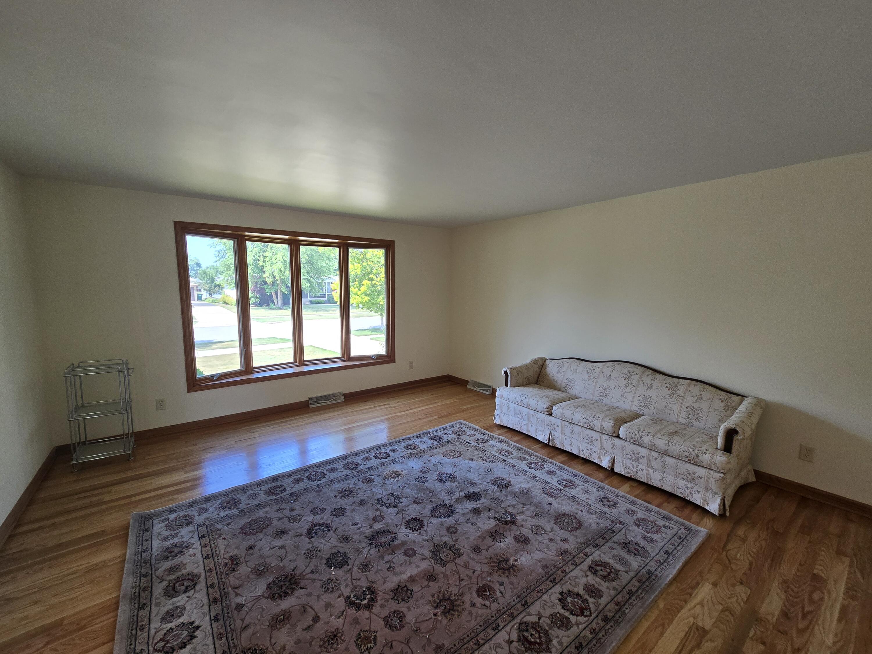 1828 Wren Drive Munster, IN 46321 - Photo 6 of 36 a living room with furniture and a rug