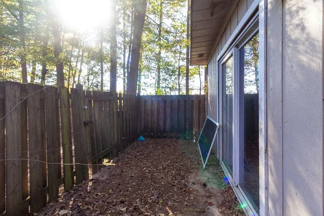 a view of backyard with green space