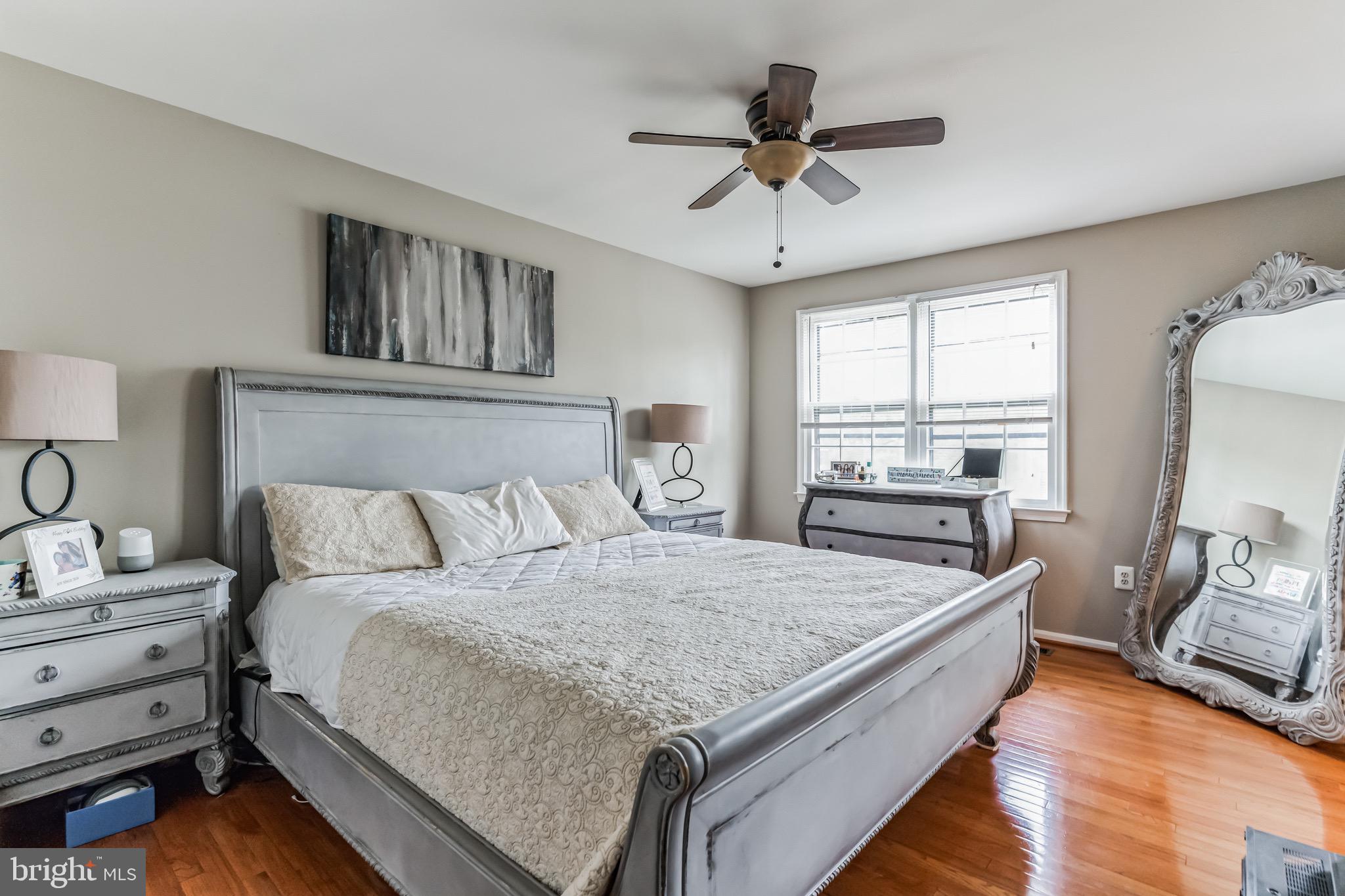 4926 Carriagepark Road Fairfax, VA 22032 - Photo 17 of 34 a bed room with a bed and a window