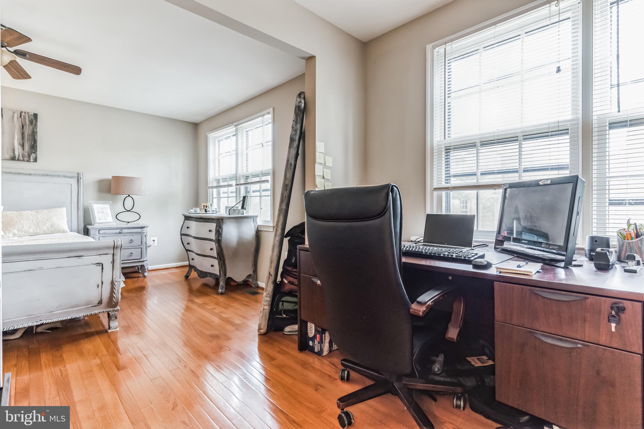 4926 Carriagepark Road Fairfax, VA 22032 - Photo 21 of 34 a view of a workspace with furniture and a window