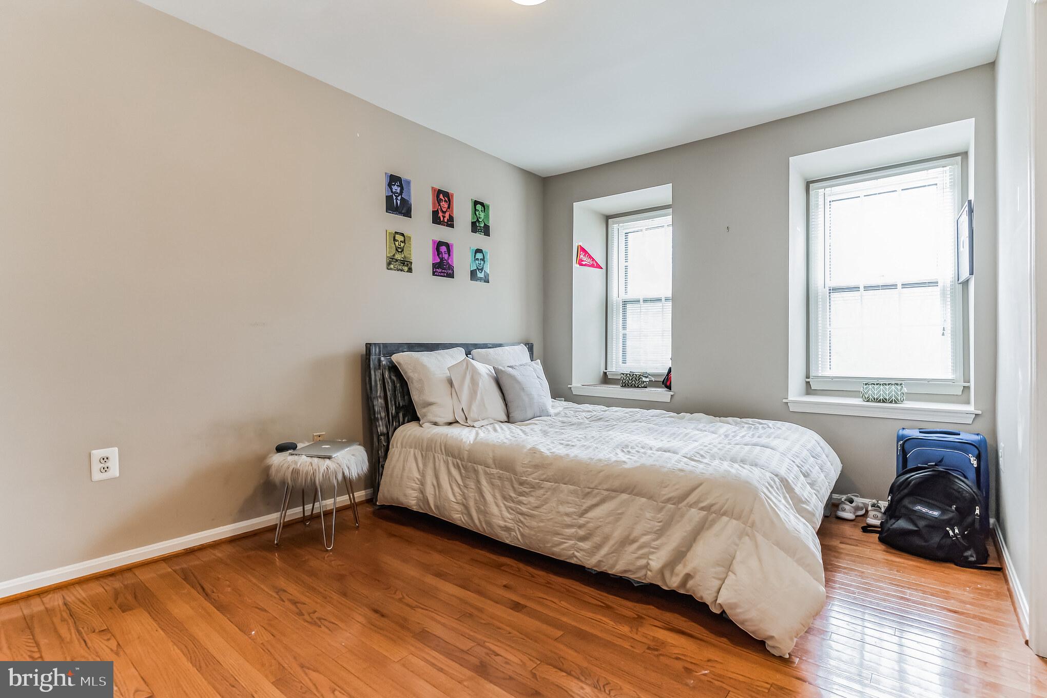 4926 Carriagepark Road Fairfax, VA 22032 - Photo 24 of 34 a bedroom with a bed and a window