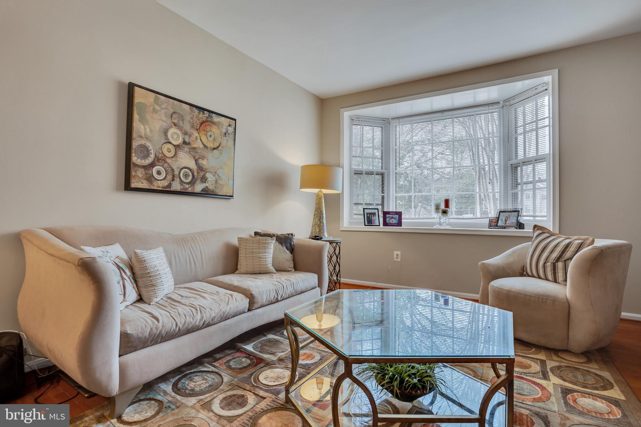 4926 Carriagepark Road Fairfax, VA 22032 - Photo 3 of 34 a living room with furniture and a large window