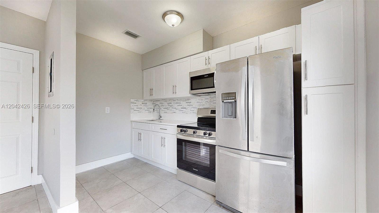 74 West 15th Street, Unit 1 Hialeah, FL 33010 - Photo 11 of 23 Kitchen