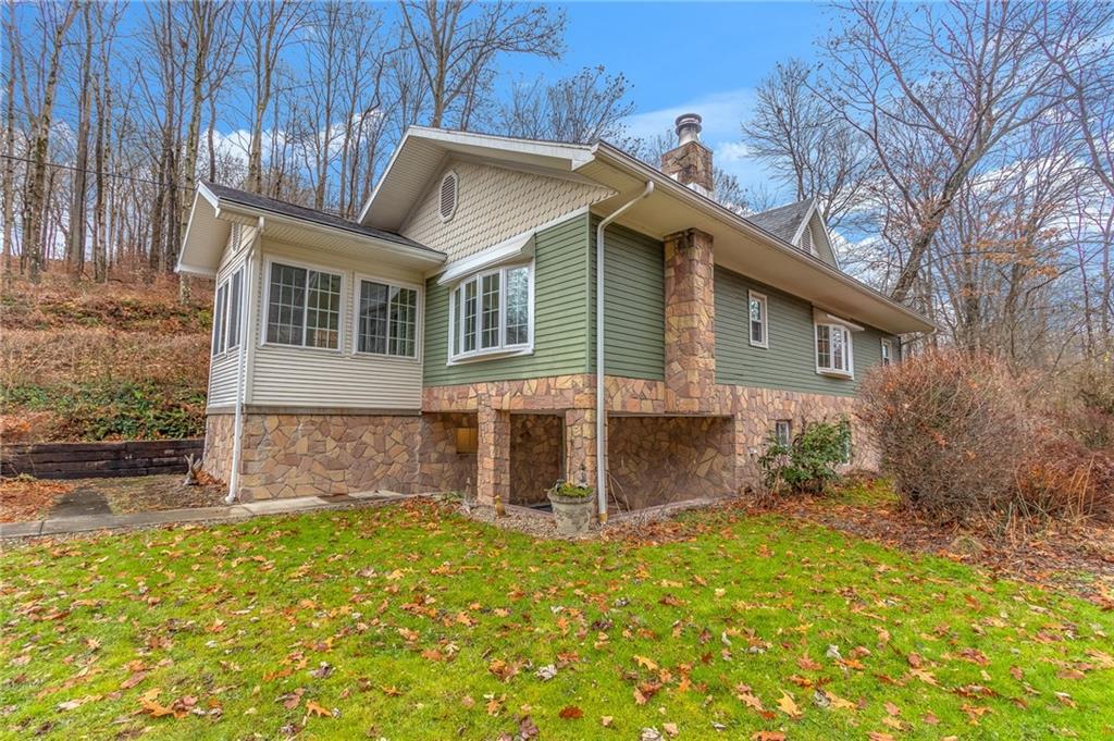293 Upper Service Road Hookstown, PA 15050 - Photo 1 of 20 Attractive ranch all updated. Aluminum siding and vinyl fish scale trim. Newer windows. Under cover lower patio from basement. Enclosed sunroom.