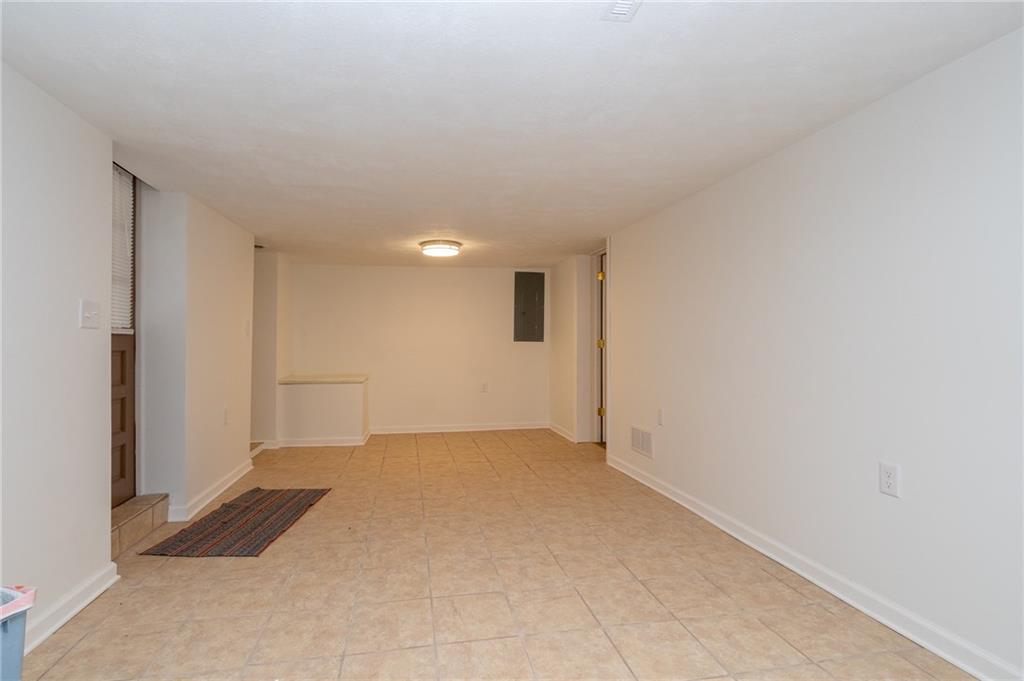 293 Upper Service Road Hookstown, PA 15050 - Photo 15 of 20 Lower level finished gameroom with ceramic tile floorx
