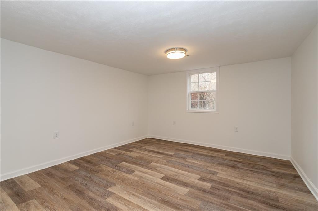 293 Upper Service Road Hookstown, PA 15050 - Photo 16 of 20 2nd finished room in lower level, vinyl floor.