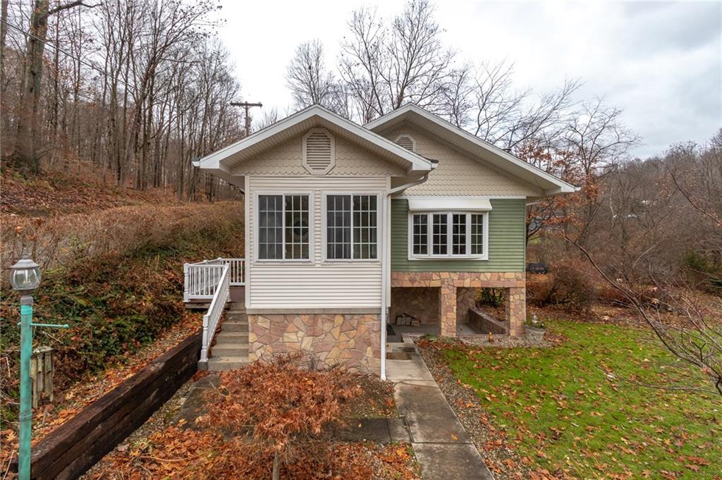 293 Upper Service Road Hookstown, PA 15050 - Photo 20 of 20 Front side of home, stairs up to sunroom.