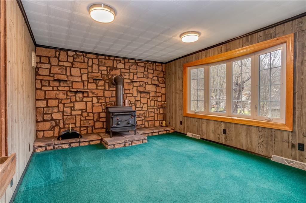 293 Upper Service Road Hookstown, PA 15050 - Photo 6 of 20 Main floor family room, large bow window, woodburner.