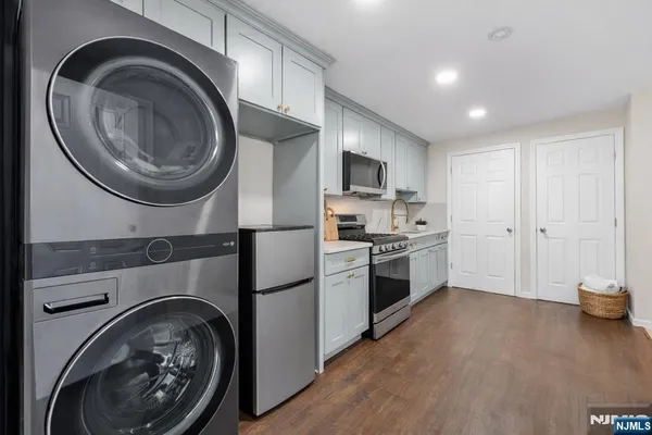 a kitchen with a washer and a dryer