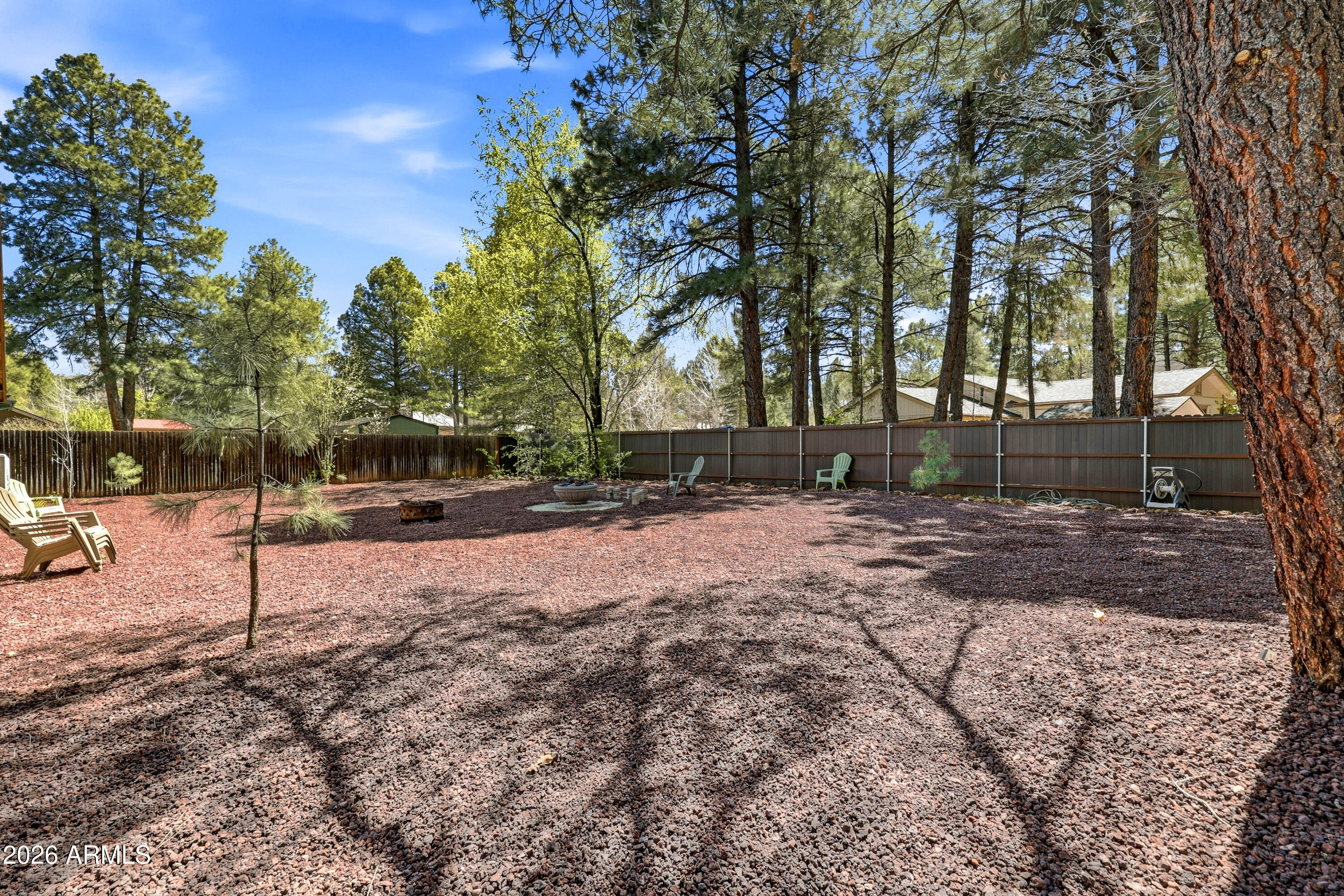 4971 Buck Springs Road Pinetop, AZ 85935 - Photo 22 of 32 a street view with tall trees