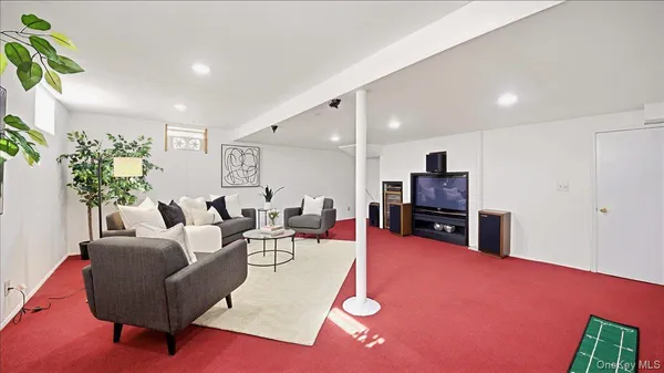 a bedroom with a bed and a table