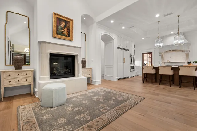 a kitchen with white cabinets stainless steel appliances and sink