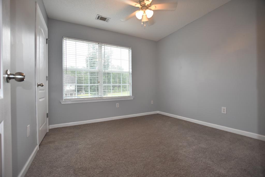 3315 Trotter''s Ridge Trail Gray, GA 31032 - Photo 14 of 26 an empty room with a window