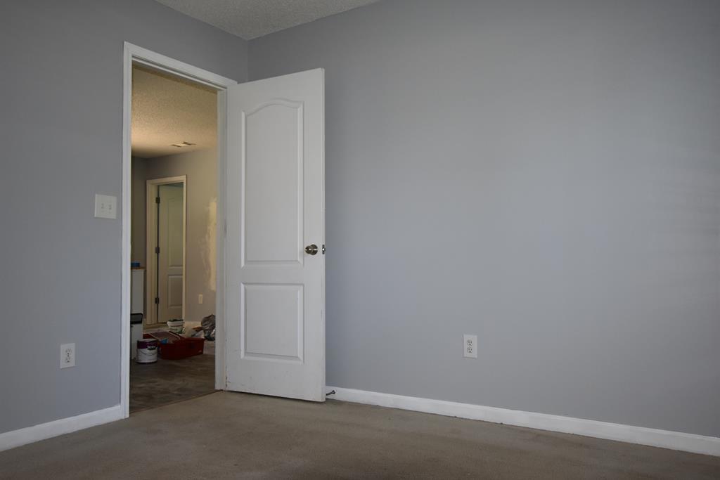 3315 Trotter''s Ridge Trail Gray, GA 31032 - Photo 20 of 26 an empty room and a bathroom