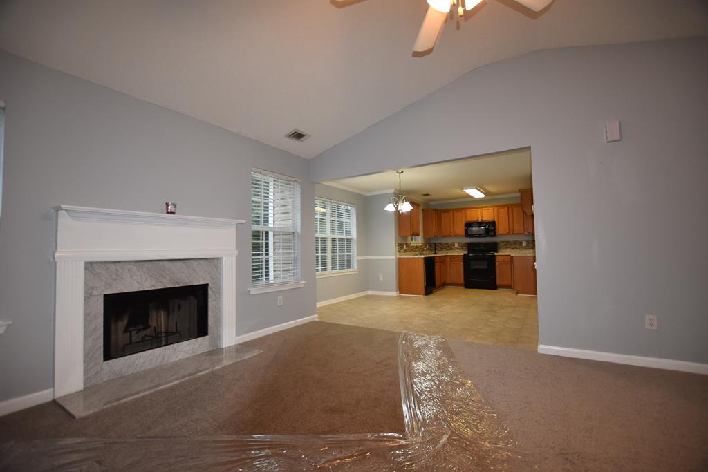 3315 Trotter''s Ridge Trail Gray, GA 31032 - Photo 3 of 26 a view of an empty room with a fireplace
