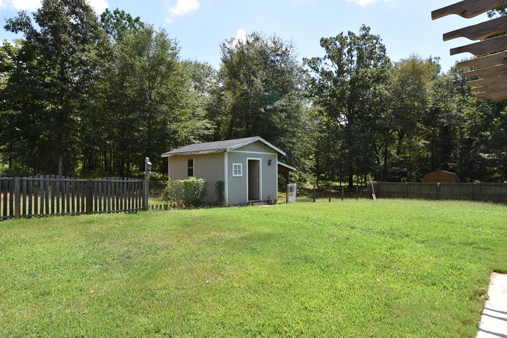 3315 Trotter''s Ridge Trail Gray, GA 31032 - Photo 23 of 26 a front view of house with yard and green space