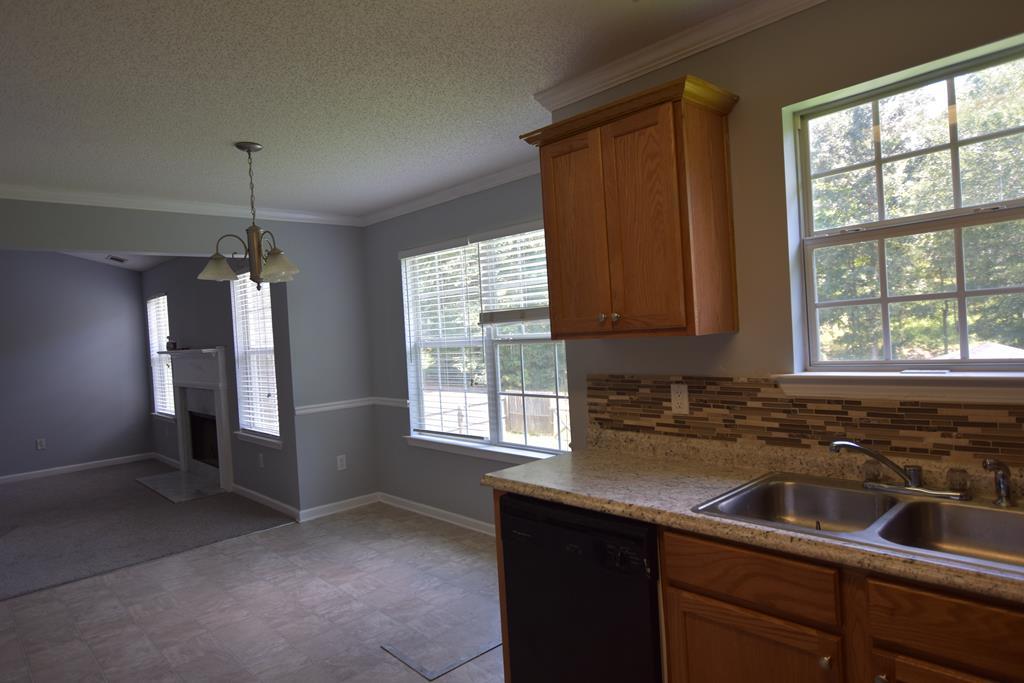 3315 Trotter''s Ridge Trail Gray, GA 31032 - Photo 7 of 26 a kitchen that has a sink cabinets and window
