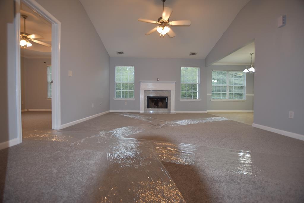 3315 Trotter''s Ridge Trail Gray, GA 31032 - Photo 9 of 26 a view of livingroom with window fireplace and ceiling fan