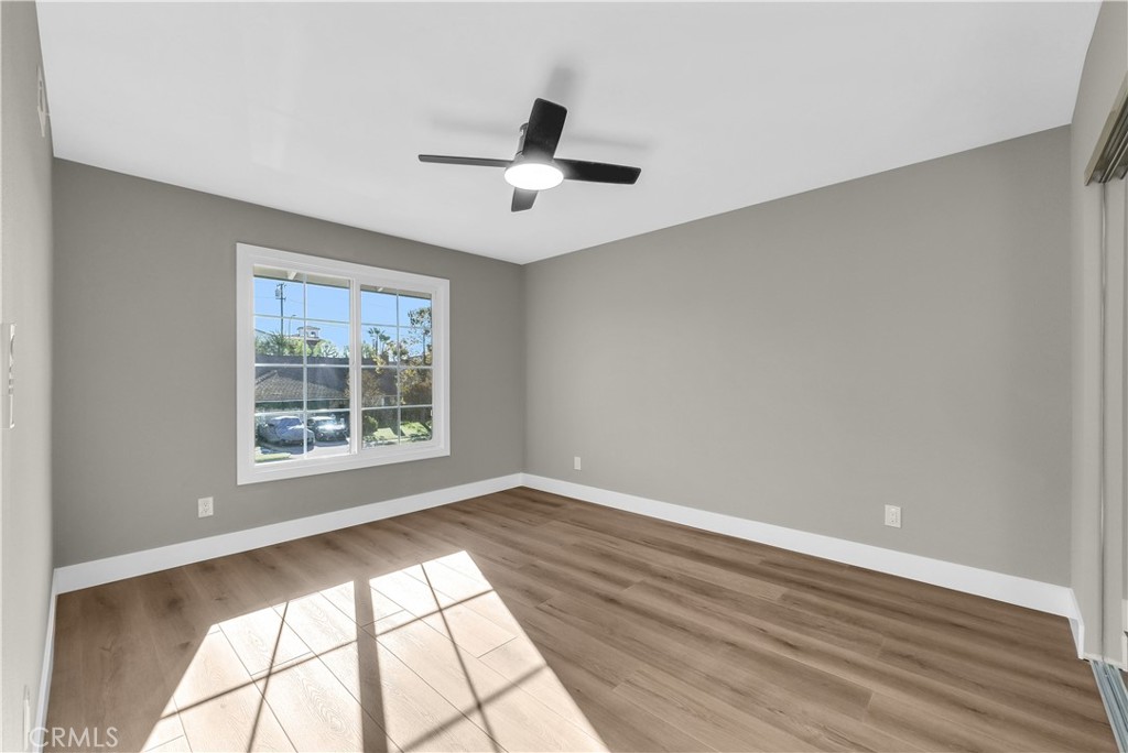 273 St Crispen Avenue Brea, CA 92821 - Photo 21 of 28 an empty room with wooden floor and windows