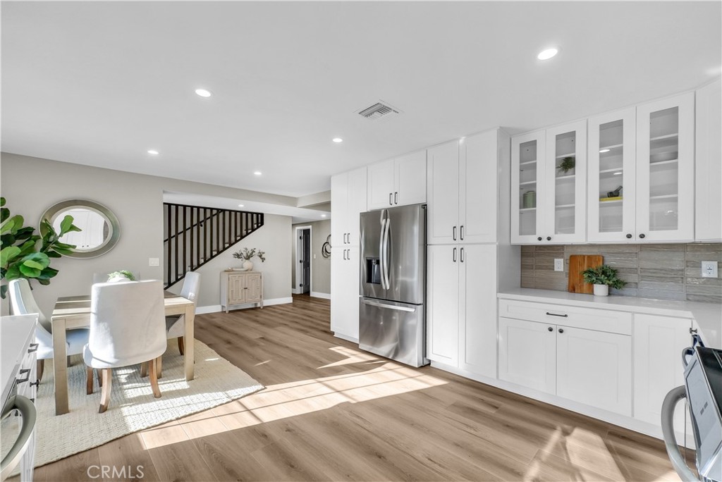 273 St Crispen Avenue Brea, CA 92821 - Photo 7 of 28 a kitchen with stainless steel appliances a refrigerator and a stove top oven