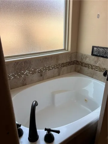 a bathroom with a bathtub