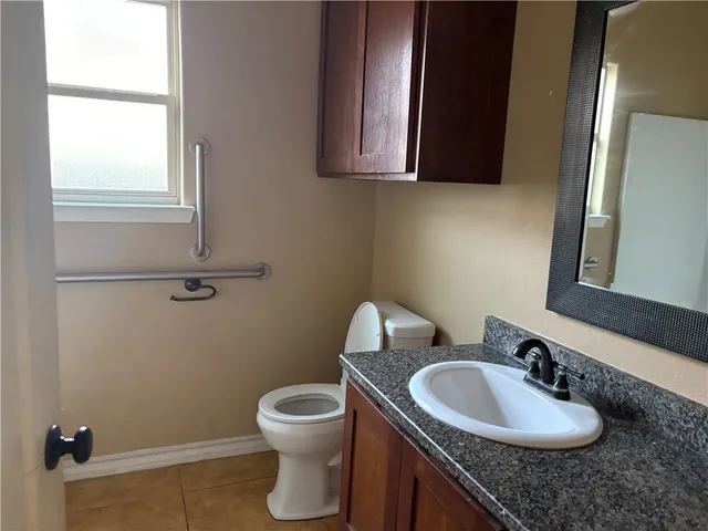 a bathroom with a sink and a toilet