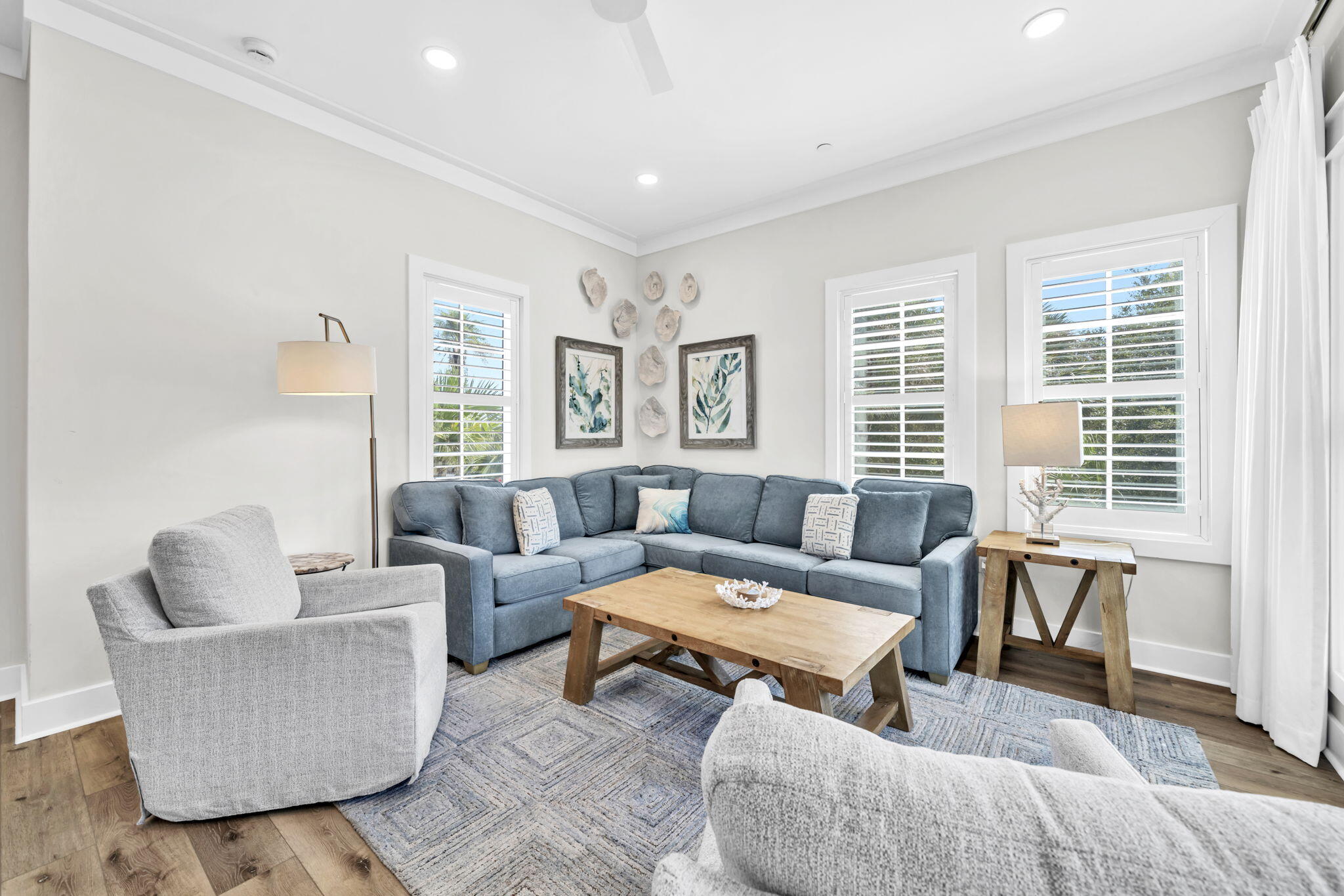 413 Henderson Cottage Way Destin, FL 32541 - Photo 12 of 70 a living room with furniture and a large window