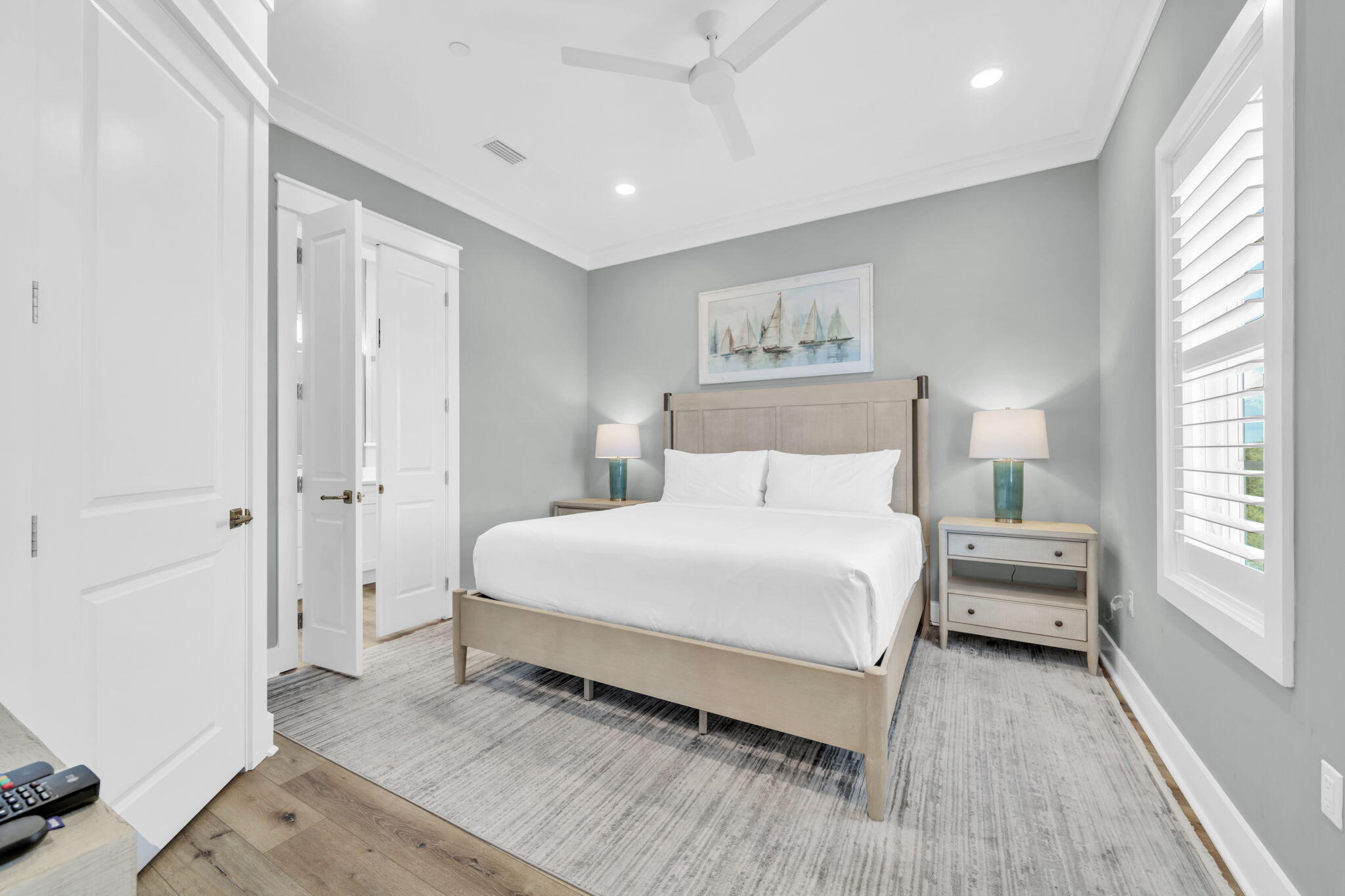 413 Henderson Cottage Way Destin, FL 32541 - Photo 21 of 70 a bedroom with a bed and a large window