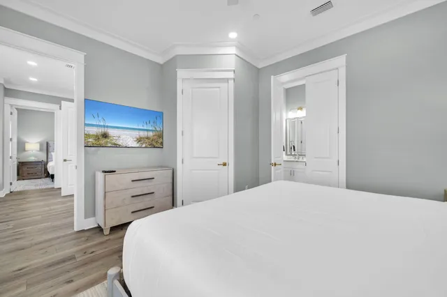 a front view of a building with lake view and boat