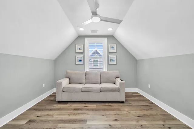 a front view of a residential apartment building with a yard