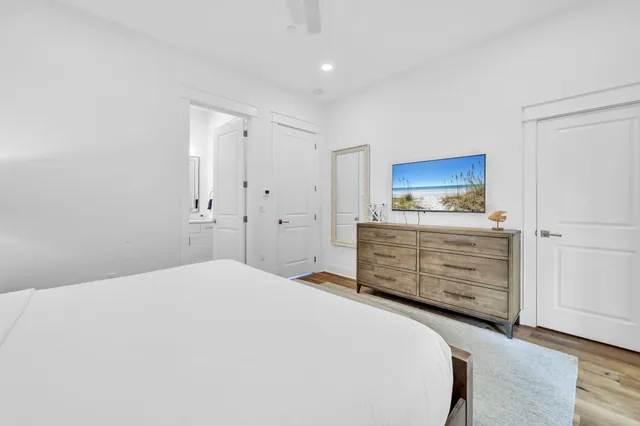 a bedroom with a bed and furniture