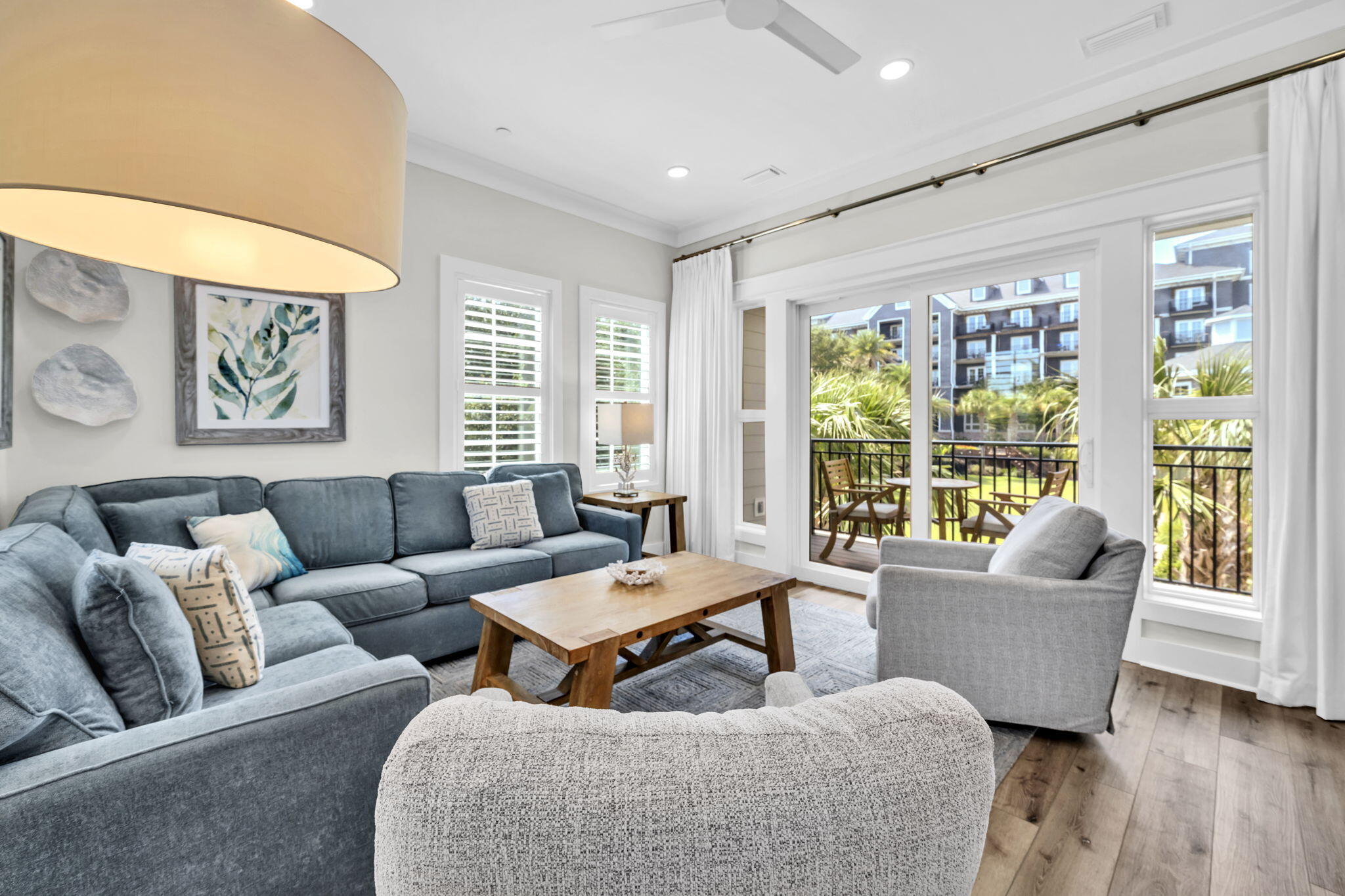 413 Henderson Cottage Way Destin, FL 32541 - Photo 9 of 70 a living room with furniture and a large window