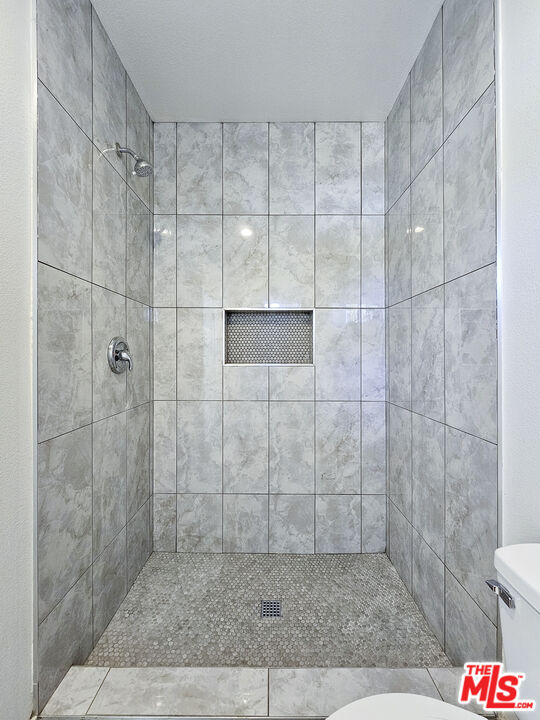 38580 Rancho Los Cerritos Drive, Unit S2 Indio, CA 92203 - Photo 11 of 44 a bathroom with a shower