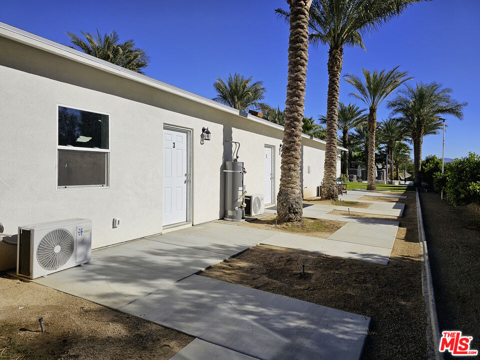 38580 Rancho Los Cerritos Drive, Unit S2 Indio, CA 92203 - Photo 14 of 44 a view of a backyard of the house