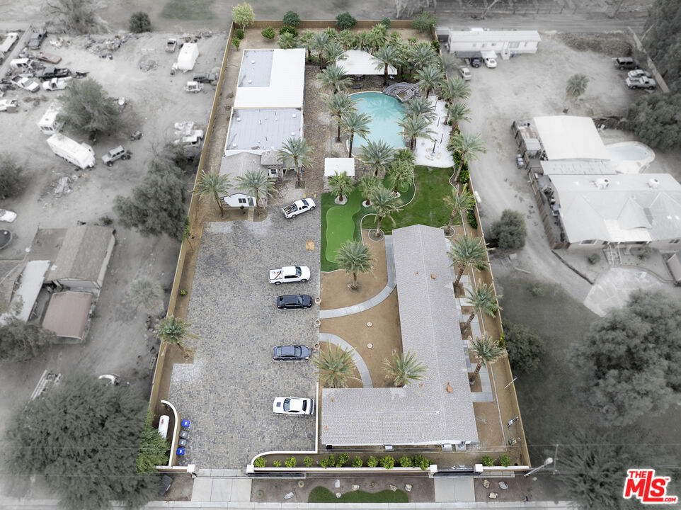 38580 Rancho Los Cerritos Drive, Unit S2 Indio, CA 92203 - Photo 31 of 44 an aerial view of residential houses with outdoor space
