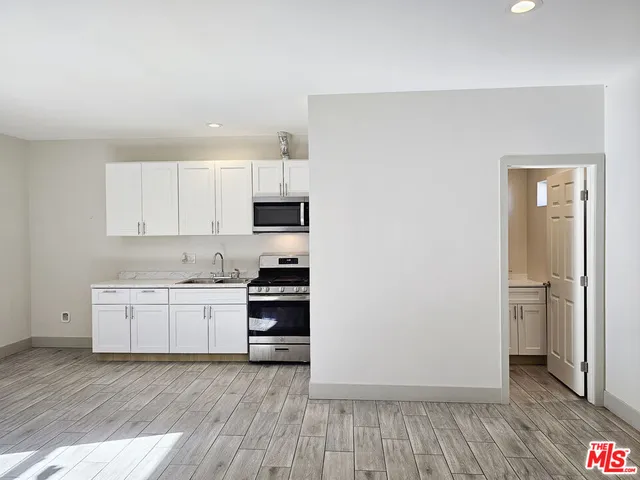 a bathroom with a toilet and a sink