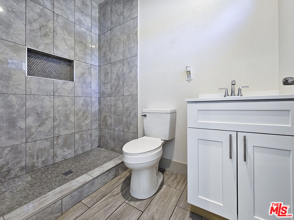 38580 Rancho Los Cerritos Drive, Unit S2 Indio, CA 92203 - Photo 10 of 44 a bathroom with a toilet and a sink