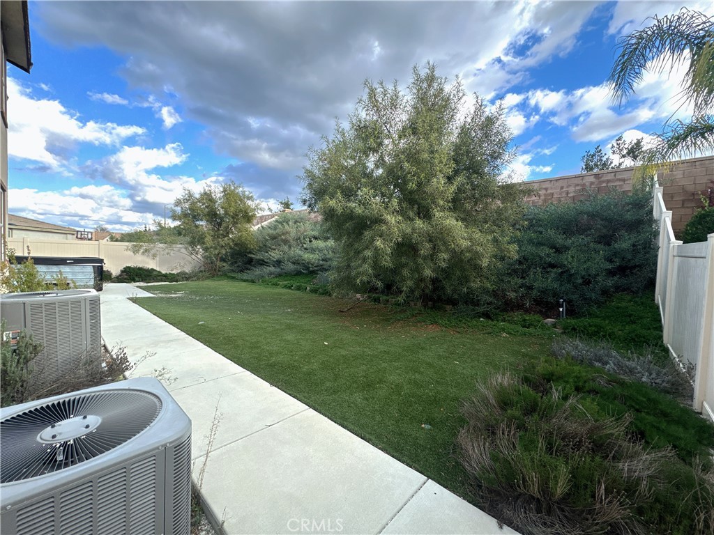 33833 Edge Temecula, CA 92592 - Photo 18 of 18 a view of a backyard with a lake view