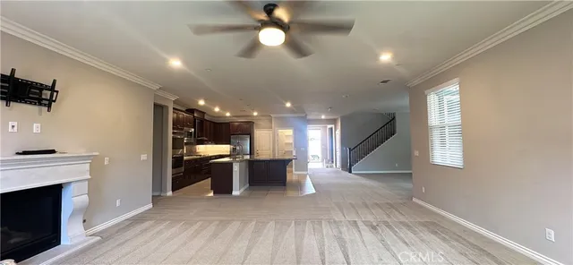a view of a kitchen and a stove top oven