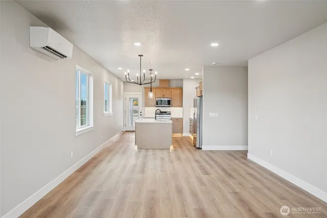 a view of kitchen with wooden floor